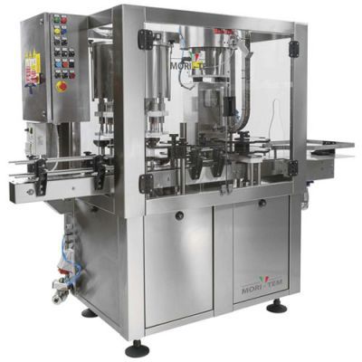 Capsuleuse automatique Capsuleuse automatique