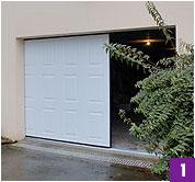 Installation porte de garage sectionnelle motorisee