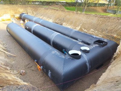 Tout savoir sur la construction d’un bassin de récupération d’eau de pluie