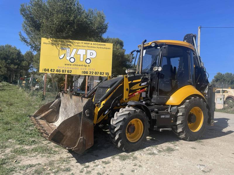 Tracto pelle MST M642 occasion - 2017, 4300 h, moteur Perkins 100 CV, 4 roues motrices, chargeur 1200 L, pelle arrière déportable et télescopique
