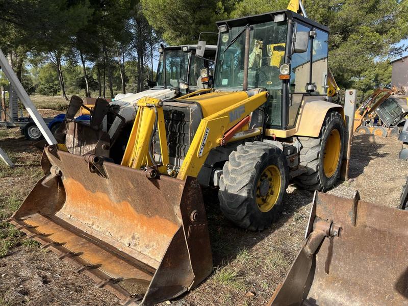 Tracto pelle MF 860 occasion - Année 1993 - 7000 heures - Attache rapide hydraulique - 2 godets 450 et 800mm