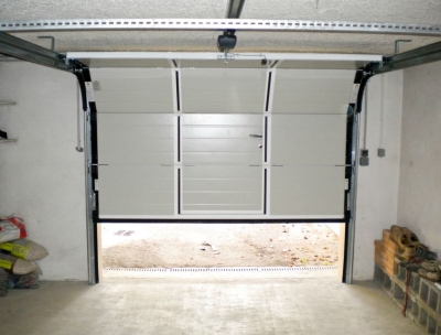 Ouverture verticale porte de garage sectionnelle
