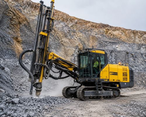 Foreuse top hammer sur chenilles