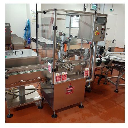 Boucheuse automatique Longoni Twist Off - matériel d'occasion - distributeur de capsules et convoyage de pots_0