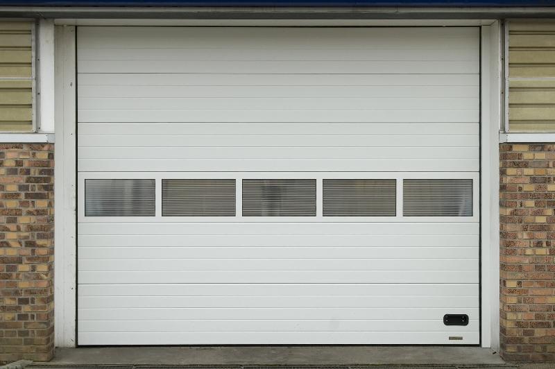 Porte de garage sectionnelle avec portillon altys_0