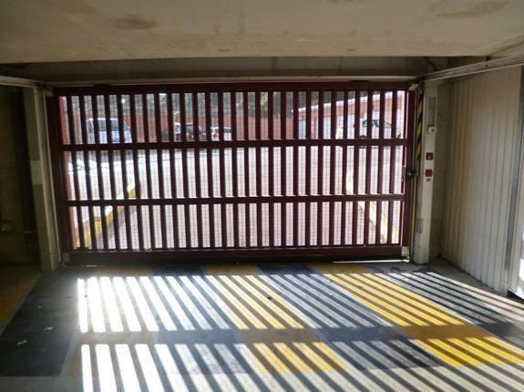 Porte de garage basculante - Scientelec - panneaux, grille ou mixte_0
