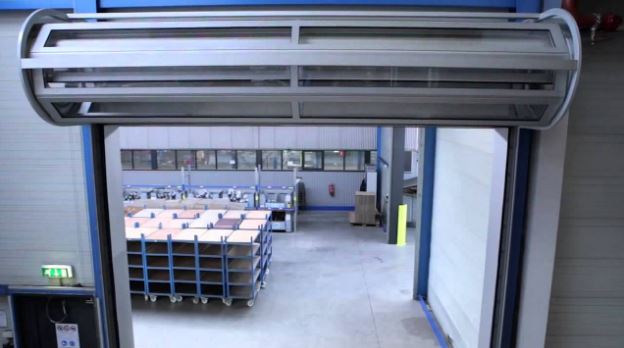 Porte sectionnelle à enroulement avec dispositif anti-effraction - prévue pour des conditions extrêmes_1