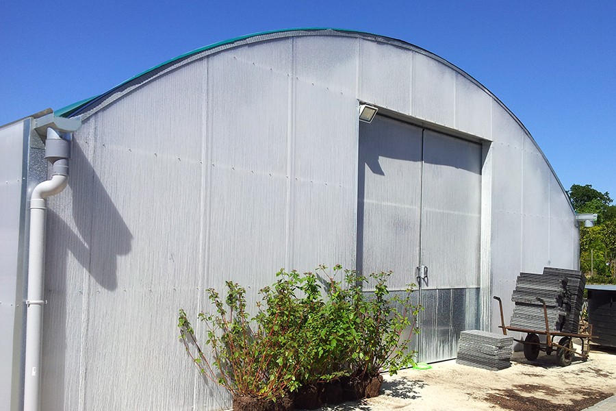 Tente de stockage fermée / structure fixe en acier / couverture unie / porte / bardage métallique / avec fondation_1