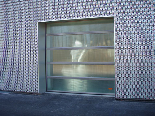 Porte sectionnelle industrielle - Panneaux aluminium isolés double paroi 610 mm x 40 mm - Finition granitée stucco_0