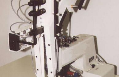 Machine de fixation automatique d'étiquettes cavalières par fil de couture - 1 distributeur - SMECRI_0