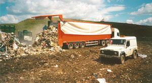Semi-remorque à fond roulant FM - chaînes et barres pour transport de déchets_0