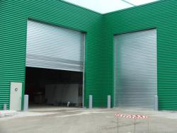 Porte sectionnelle industrielle 515 rmg / automatique / repliable plafond / plein / en métal_0