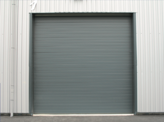 Porte sectionnelle industrielle isolée - repliable en plafond - pleine - réduction des pertes d'énergie_0