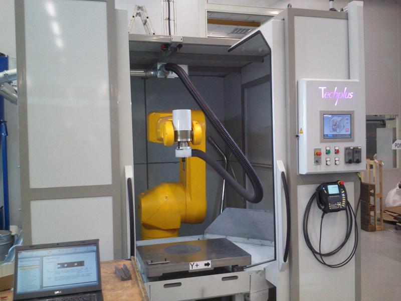 Machine d'ébavurage multibroche sur pièce acier - monobloc avec plateau rotatif et broches électriques 5 axes_0