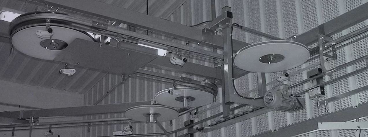 Système de convoyage aérien par trolleys fixés sur câble pour l'accumulation de charges allant jusqu'à 100 kg dans tous types d'industries - BOREAL_0