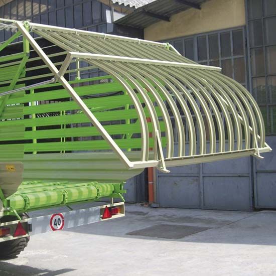 Machine agricole avec barre de coupe rotative à deux tambours réglables en hauteur