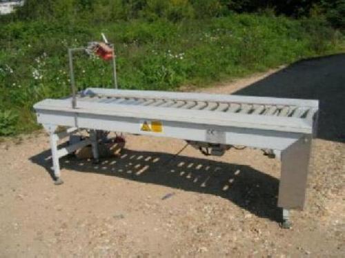 Tapis à rouleaux motorisé d'occasion - marque TAPIS - rouleaux de 590 mm - encombrement 2400x700x800 mm_0