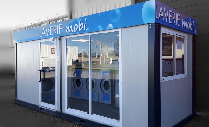 Mobi® eco - Bungalow laverie mobile avec 5 pompes à lessive - Équipement Electrolux pour machines à laver et séchoir_0