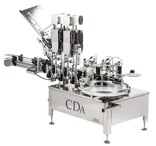 Machine de sertissage et d'étiquetage pour les bouteilles - LEA_0