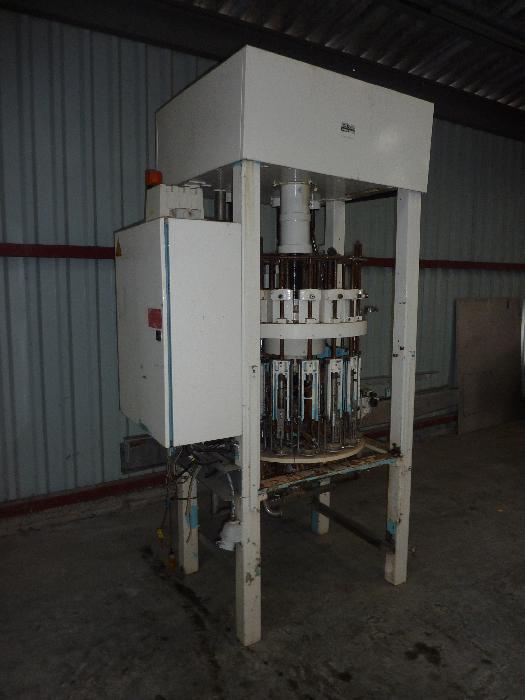 Remplisseuse liquide PKB 3R d'occasion - 16 becs rotatifs à remplissage constant_0