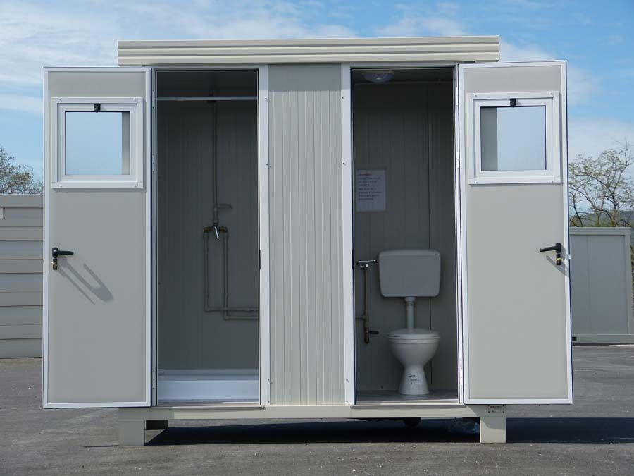 Bungalow sanitaire de chantier avec un WC à l'anglaise, une douche et un lave-mains -  SD1_0