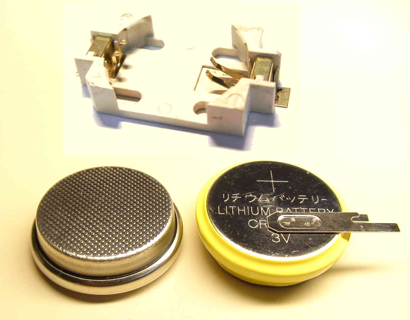 Pile bouton lithium - LiMnO2 3,0V - Support montage CI et encastrable_0