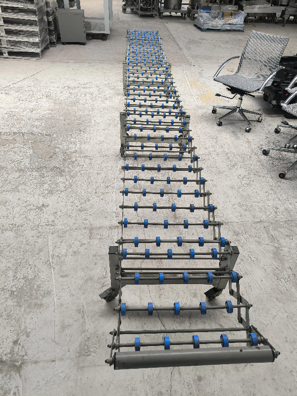 Convoyeur à rouleaux extensible d'occasion_0