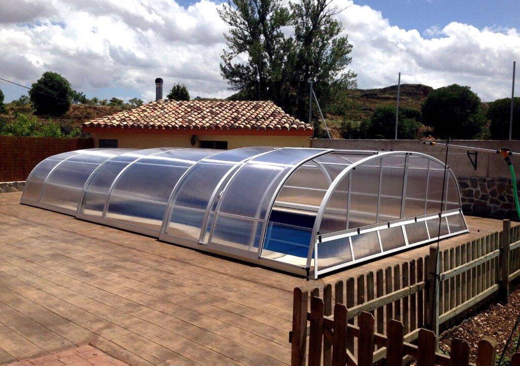 Abri piscine mi-haut Madeira Line - télescopique en polycarbonate avec rails plats_0