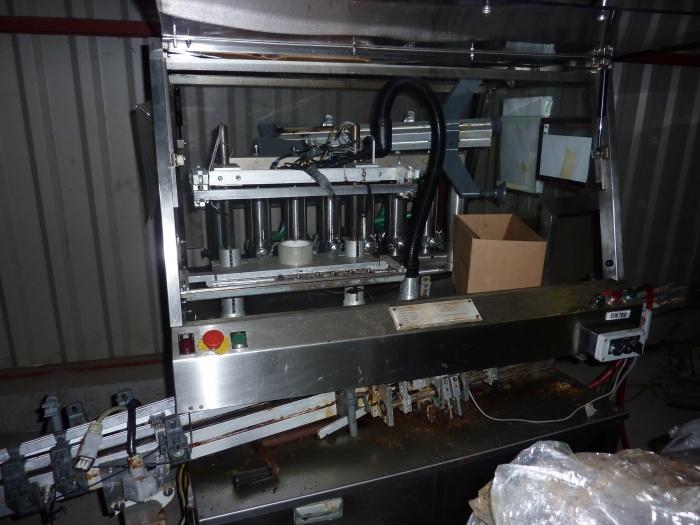 Remplisseuse linéaire liquide d'occasion Kalix - modèle linéaire avec 6 pompes de dosage volumétrique et becs plongeants_0