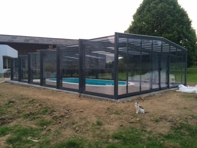 Abri piscine haut télescopique en polycarbonate - façade escamotable et sans rail - hauteur 2,60m_0