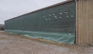 Filet brise-vent adapté aux bâtiments d’élevage