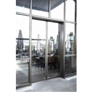 Porte coulissante avec fonction passage de fuite redondante