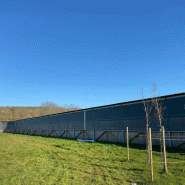 Filet brise-vent fixe et sectionnel - protection contre les intempéries avec ventilation, ignifuge M1/M2, garantie 10 ans