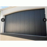 Porte de garage sectionnelle maestro évolution / motorisée / coulissante latérale / avec portillon et hublot / isolation thermique