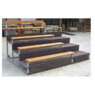 Tribune sur roulettes 4 rangs à usage intérieur, permettant l'aménagement de salles de sport ou de spectacles Tribune sur roulettes 4 rangs à usage intérieur, permettant l'aménagement de salles de sport ou de spectacles