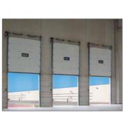 Porte sectionnelle industrielle en acier de 40 mm. d'épaisseur, équipées de ressorts robustes qui facilitent les ouvertures manuelles ou motorisées - GLG