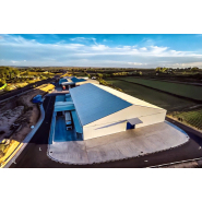 Bâtiment de stockage industriel grande portée (40-60 m) - Structure acier haute résistance neige/vent - Montage rapide