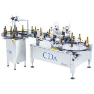Étiqueteuse automatique Ninon 1500/2500 - Pour produits cylindriques avec options avancées d'étiquetage