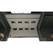 Porte sectionnelle pour les grandes ouvertures Porte sectionnelle pour les grandes ouvertures