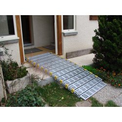 Rampe d'accès enroulable Roll-a-ramp - portable, légère, robuste et conforme aux normes européennes