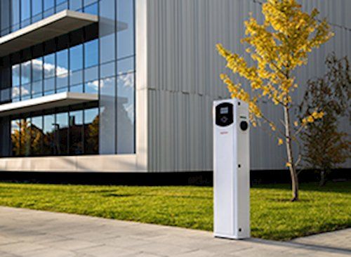 Station de recharge double pour véhicules électriques avec gestion dynamique de la charge