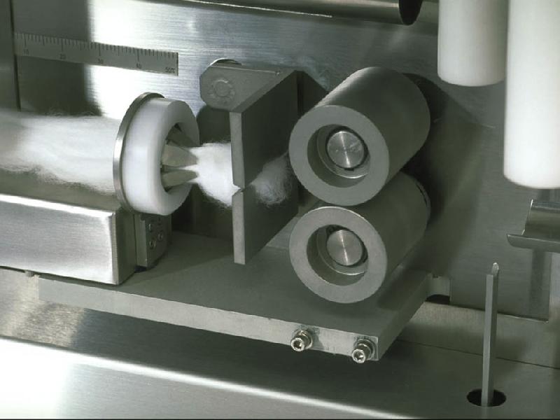 CL 110 - Cotonneuse automatique pour insertion de coton, rayonne ou polyester - 110 contenants par minute_1