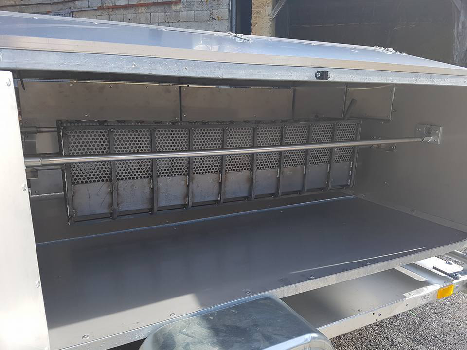 Appareil de cuisson double tournebroche pour traiteurs