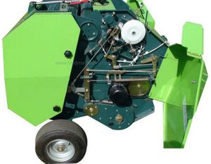 Machine compacte avec système de ficelle auto-binding