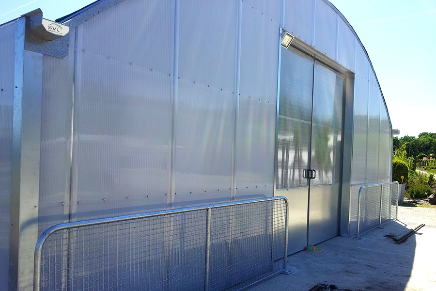 Tente de stockage fermée / structure fixe en acier / couverture unie / porte / bardage métallique / avec fondation_2