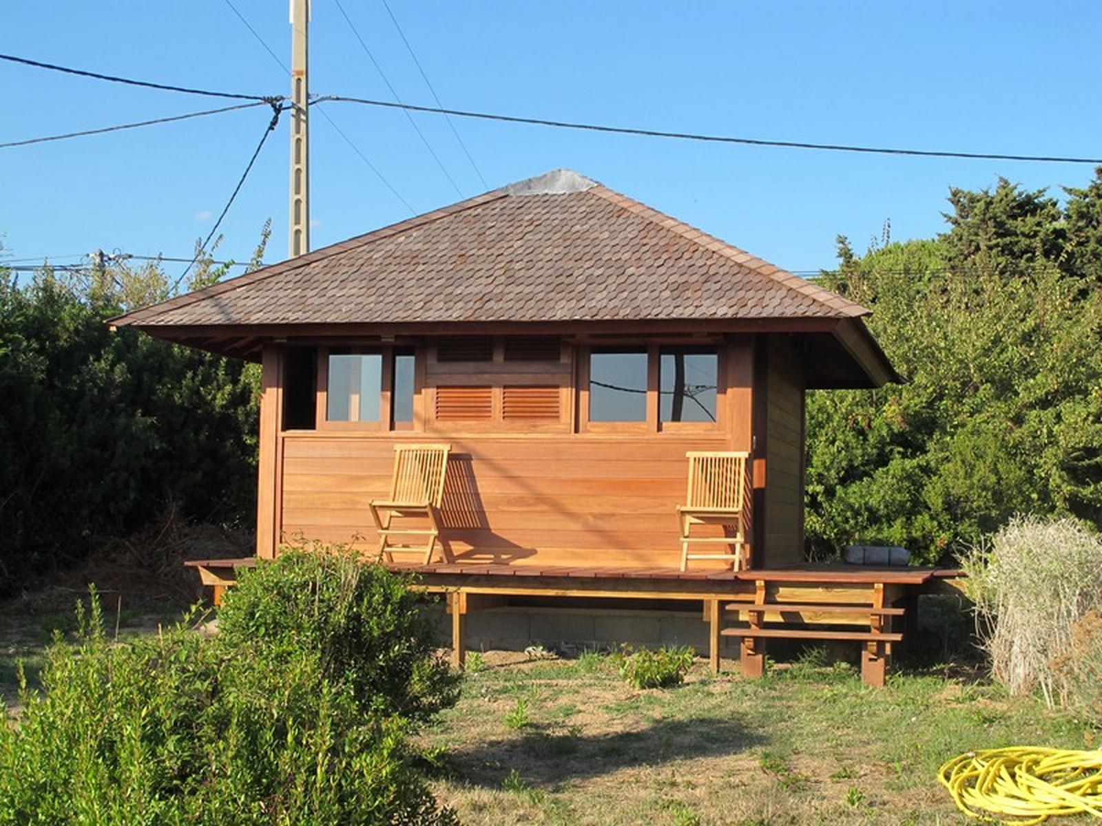 Chalet en bois a plain-pied / 18 m² / en kit / toit multipente