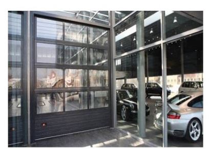 Porte sectionnelle industrielle motorisée - panneaux aluminium extrudé 1.8 mm laqué - double acrylique 4+4 mm_1