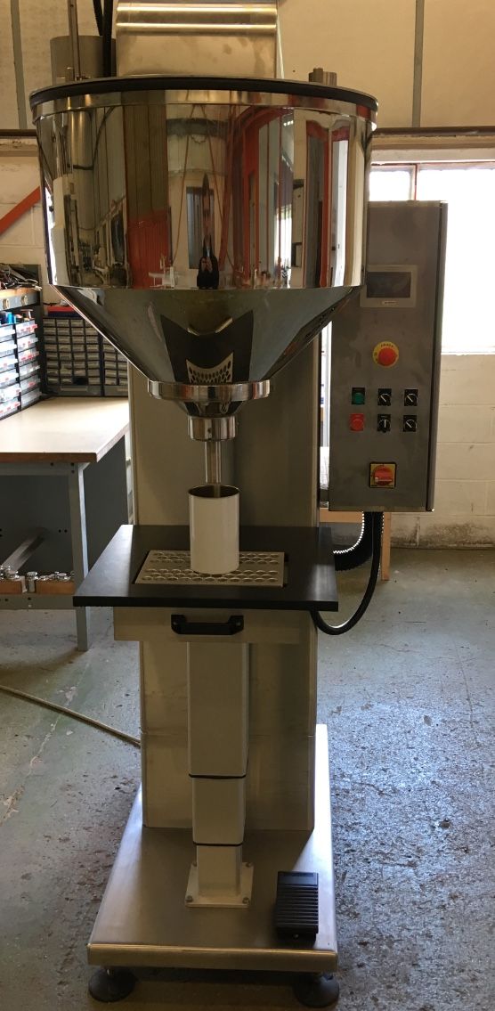 Doseuse pour pesée de petits granulés et poudres