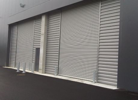 Rideau métallique à lames isolées - Acier galvanisé 275g/m² - Options anti-bruit et Grand Vent_1