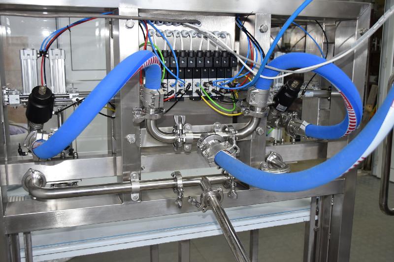 Machine de remplissage semi-automatique - 2 têtes - bag-in-box, bouteilles ou conteneurs - compatible pasteurisateurs Dion Engineering_1